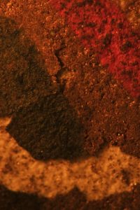 Detail of flaking paint under magnification Detail of flaking paint under magnification